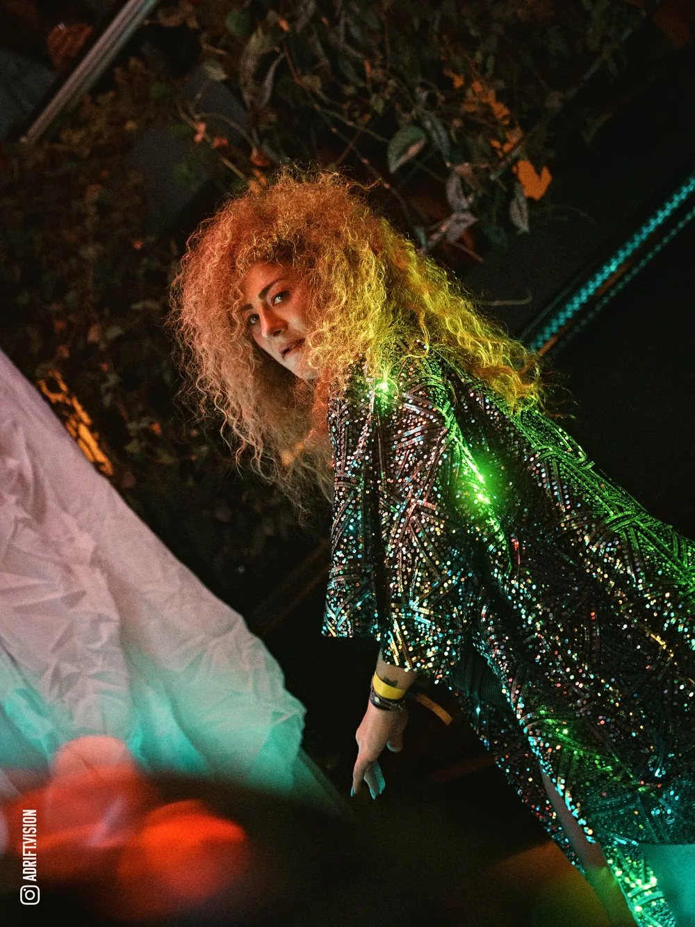 Sequinned robe under the lights
