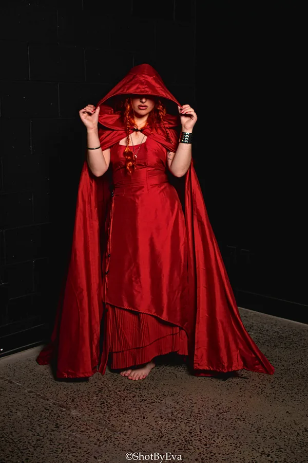 Dress and long hooded cape in red satin
